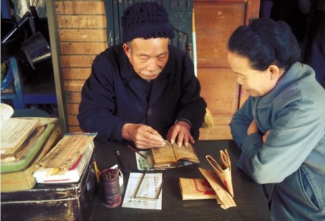 陌生又熟悉！一名日本人鏡頭下的「1979年臺灣」　其中「撐黑傘的新娘」引發網友熱議