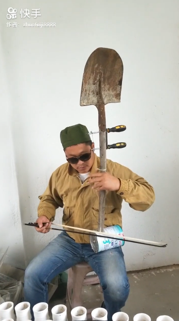 高手在民間！男子「用鏟子鐵罐」打造二胡　拉出「超神奇旋律」網友都跪了